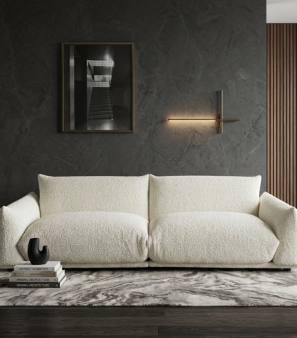 Modern cream white boucle sofa with deep seating and puffy armrests in minimalist luxury living room UAE