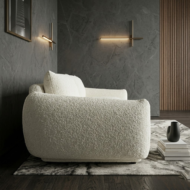 Modern cream white boucle sofa with deep seating and puffy armrests in minimalist luxury living room UAE