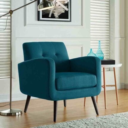Modern accent chair for living room – blue fabric armchair with thick cushioning and contemporary style