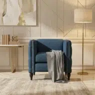 Elegant living room accent chair in navy blue fabric – upholstered arm chair with cushioned comfort and classic design