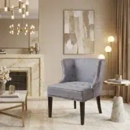 Grey upholstered 1 seater sofa chair – modern accent armchair with cushioned comfort for living room and lounge interiors