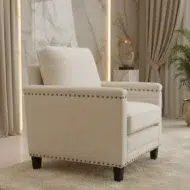 Classic ivory fabric arm chair with nailhead trim and wooden legs in ajman uae by kustomdeco