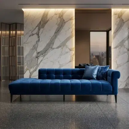Luxury deep blue velvet lounge sofa with tufted design and chaise extension in modern marble interior living room UAE