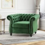 Luxury living room accent chair in emerald green velvet – upholstered arm chair with deep button tufting