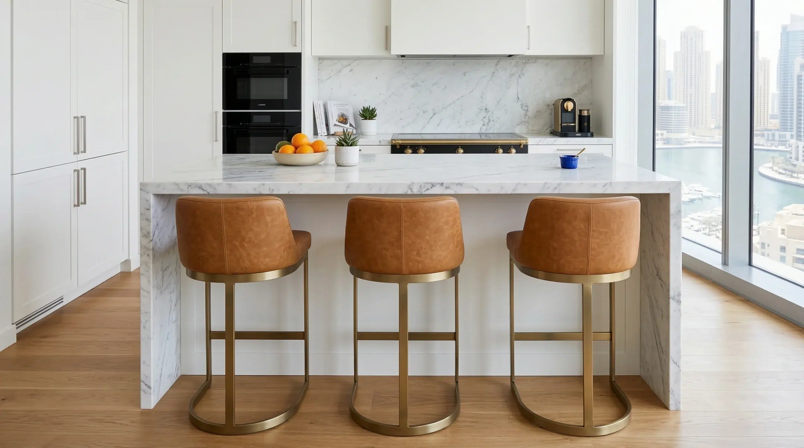 Custom counter stools in faux leather at a Dubai kitchen island — Kustom Deco