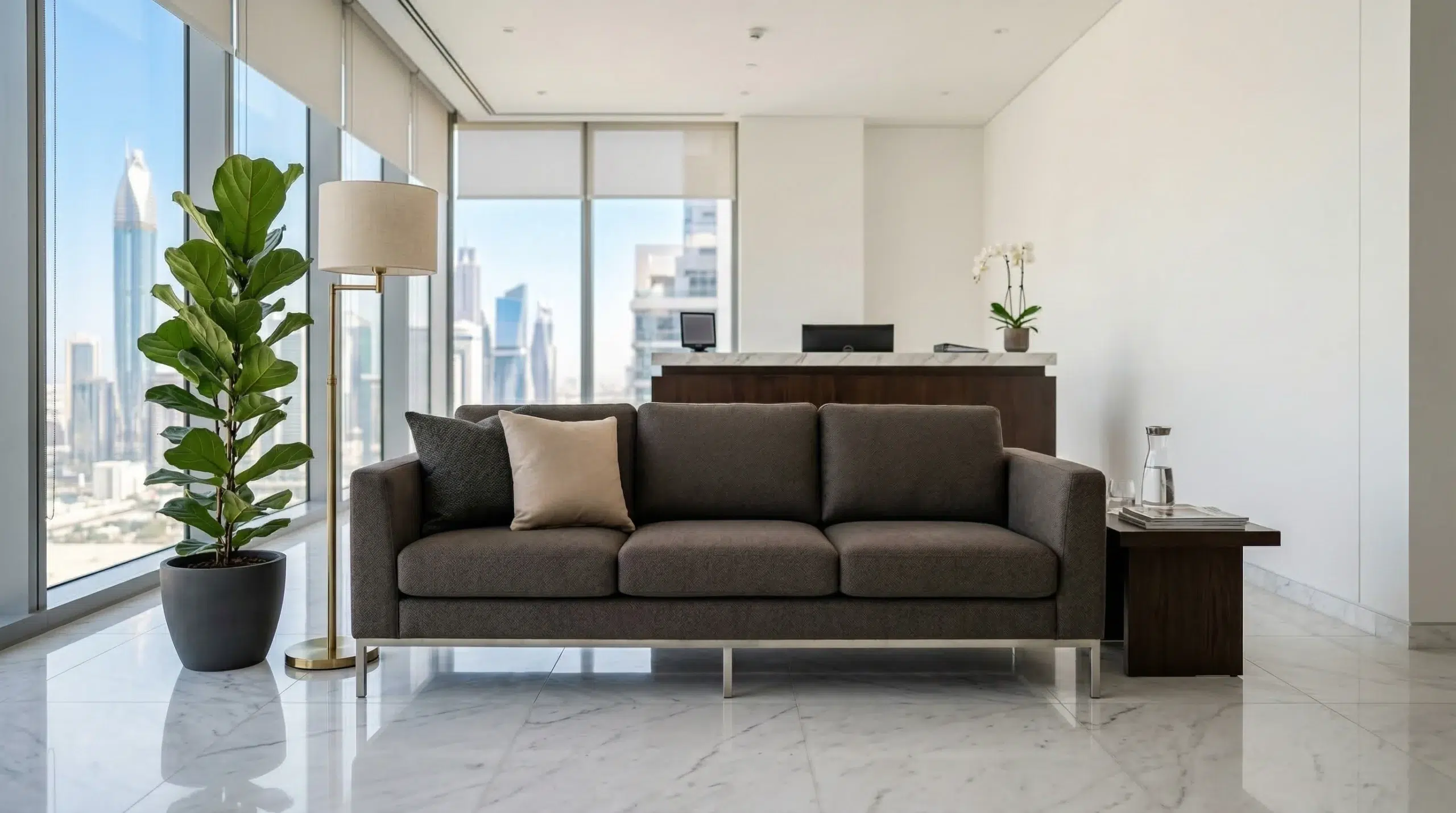 Custom office sofas Dubai charcoal performance fabric 3-seater in modern commercial reception area