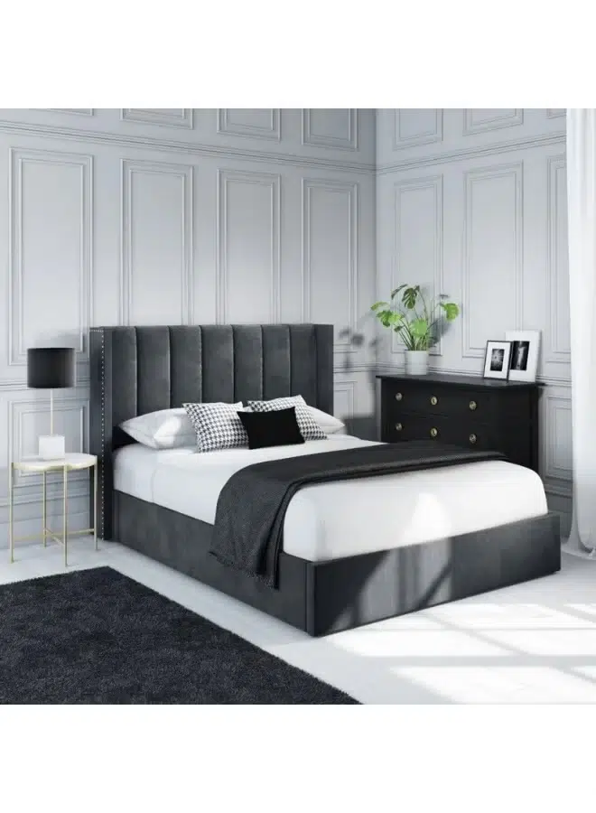 Comfort Calm Grey Velvet Ottoman Bed Comfort Calm Grey Velvet Ottoman Bed with vertical tufting and gas-lift storage for luxury bedroom furniture Dubai UAE