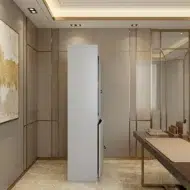 Elgraviax steel storage cabinet for office furniture with sliding glass doors, lower lockable storage, and light grey steel finish in a modern UAE office.