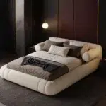 buy curved upholstered bed Dubai UAE cream modern bed for bedroom furniture UAE best bed for small rooms and luxury interiors.