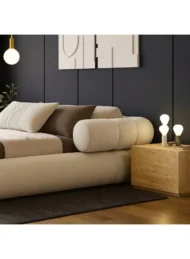 buy curved upholstered bed Dubai UAE cream modern bed for bedroom furniture UAE best bed for small rooms and luxury interiors.