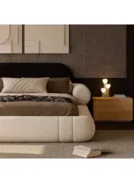 buy curved upholstered bed Dubai UAE cream modern bed for bedroom furniture UAE best bed for small rooms and luxury interiors.